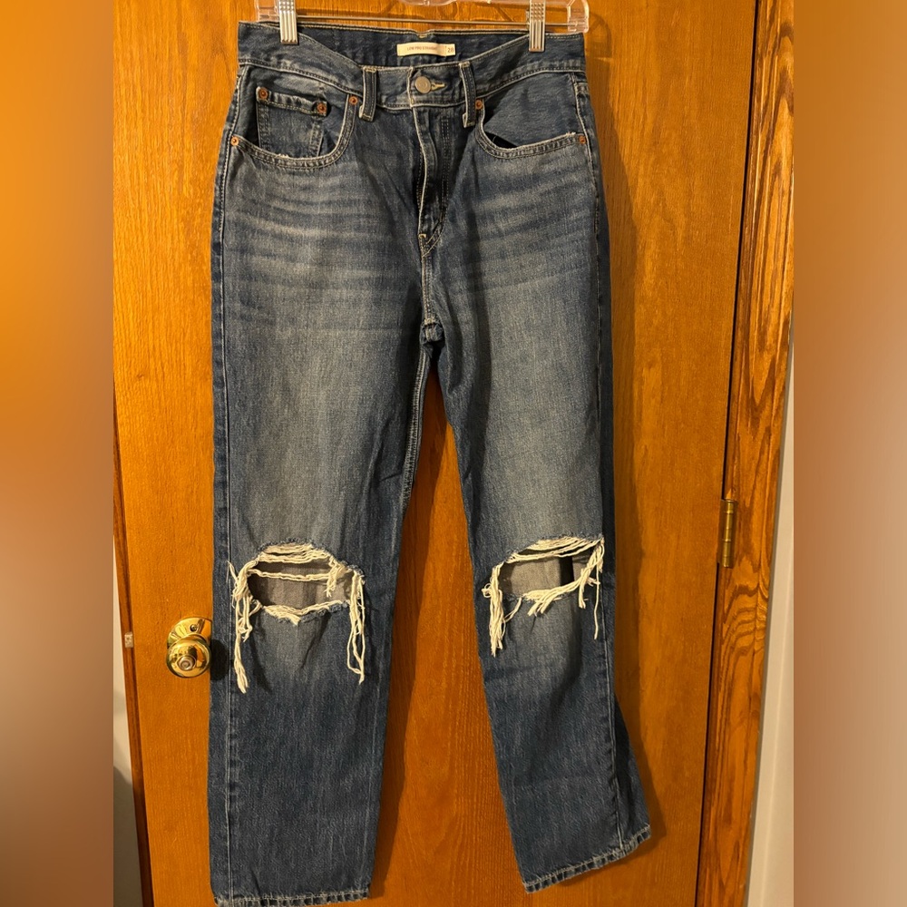 Distressed Blue Jeans